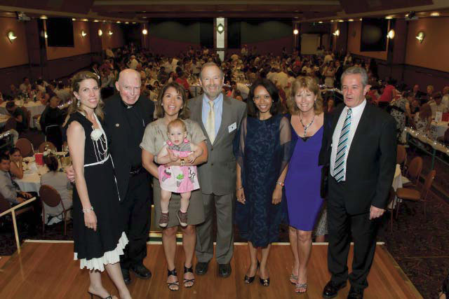 L-R: Peta Evans, Mons.Reilly, Vera Mosher holding Therese Griffin, Steven Mosher, Maria Campos, Christine and Paul Hanrahan